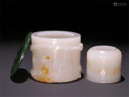 A Chinese Carved Jade Thumb Ring with Box