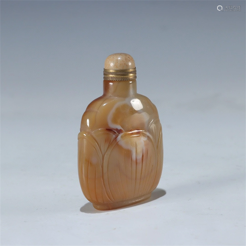 A Chinese Carved Stone Snuff Bottle