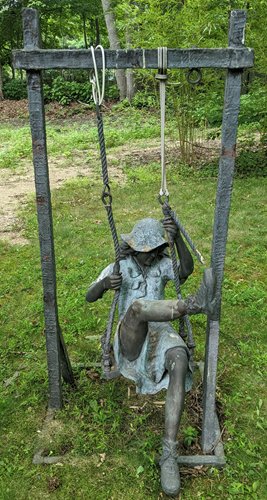 Bronze Outdoor Sculpture of Girl on Swing