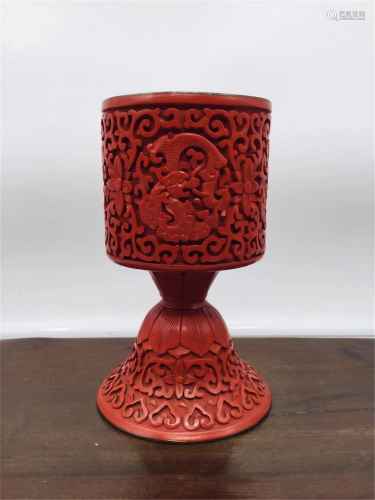 A CHINESE CARVED RED LACQUER CHI-DRAGON STEM CUP