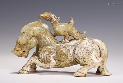 A CHINESE JADE CARVED MYTHICAL BEASTS