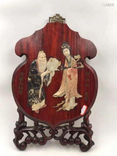 A SOAPSTONE FIGURES STORY AND HARDWOOD HANGING SCREEN