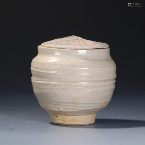 A CHINESE PALE CELADON JAR AND COVER