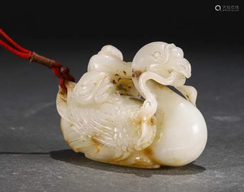 A CHINESE JADE CARVED DECORATION