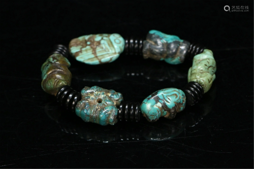 A STRING OF CHINESE TURQUOISE BRACELET