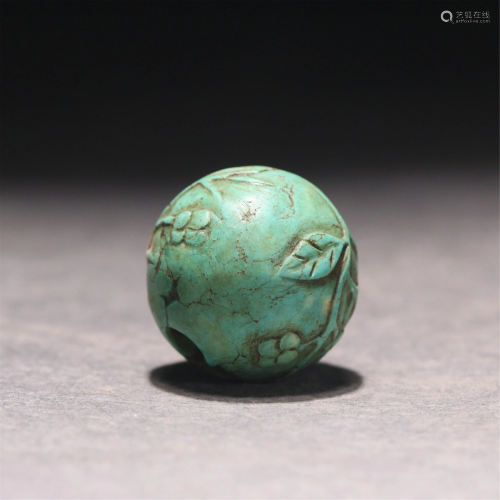 A CHINESE INCISED TURQUOISE BEAD