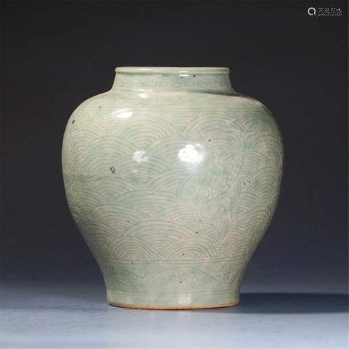 A CHINESE FISH-AND-WATER CELADON JAR