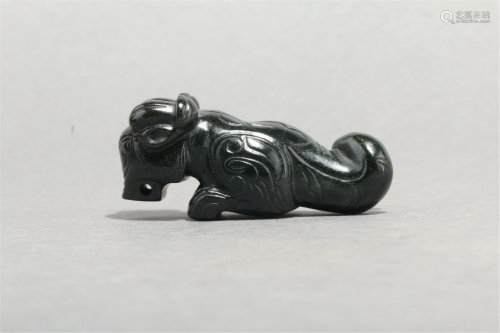 A CHINESE JADE CARVING OF MYTHICAL BEAST
