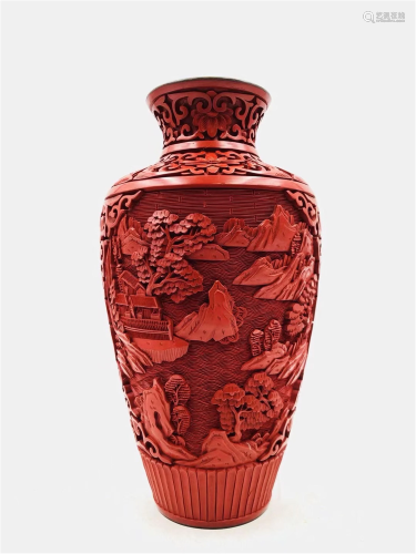 A CARVED RED LACQUER LANDSCAPE VASE