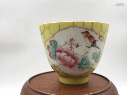 A FAMILLE ROSE FLOWER-AND-BIRD PORCELAIN CUP