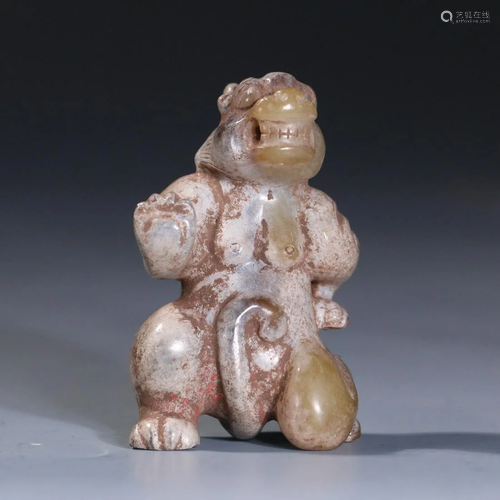 A CHINESE ARCHAISTIC JADE CARVING OF BEAR