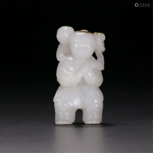 A CHINESE JADE CARVED DECORATION OF CHILD