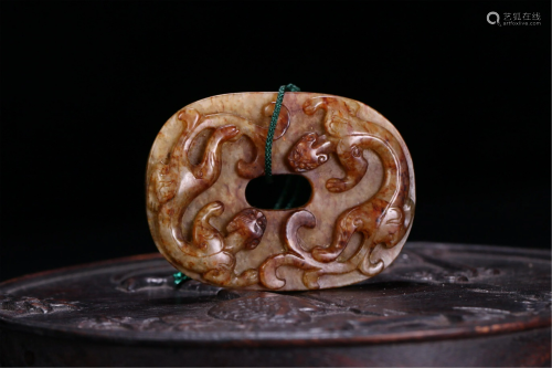 A CHINESE CARVED CHI-DRAGONS JADE BI