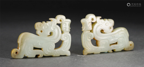 A PAIR OF CHINESE JADE BI