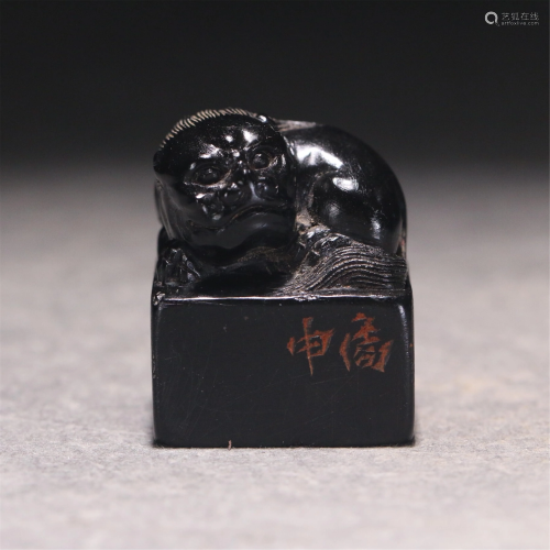 A CHINESE BLACK HARD-STONE CARVED BEAST SEAL
