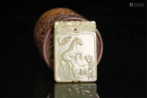 A CHINESE INSCRIBED DOUBLE HORSES YELLOW JADE PEN…