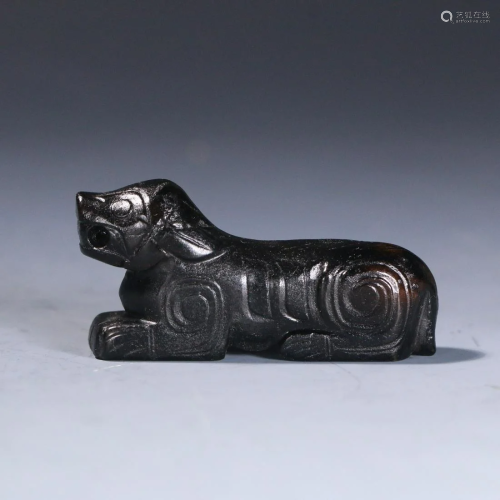 A CHINESE JADE CARVED DECORATION OF MYTHICAL BEAST