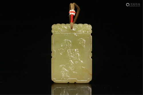 A CHINESE INSCRIBED YELLOW JADE FIGURAL PENDANT