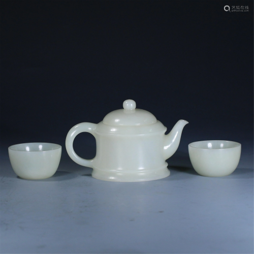 A CHINESE JADE TEA POT AND TWO JADE CUPS