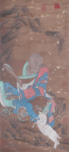 A CHINESE PAINTING OF ARHAT AND WHITE GOAT