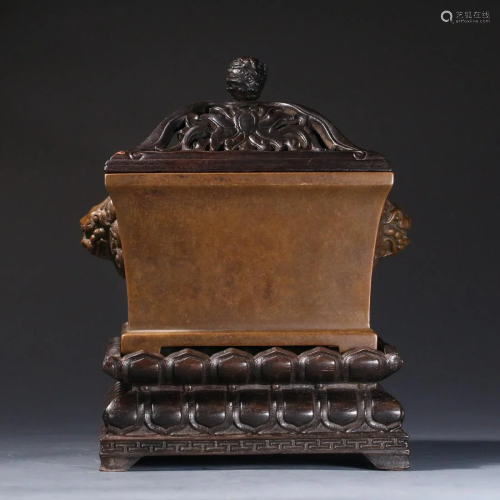 A CHINESE SQUARE BRONZE CENSER WITH LION HANDLES
