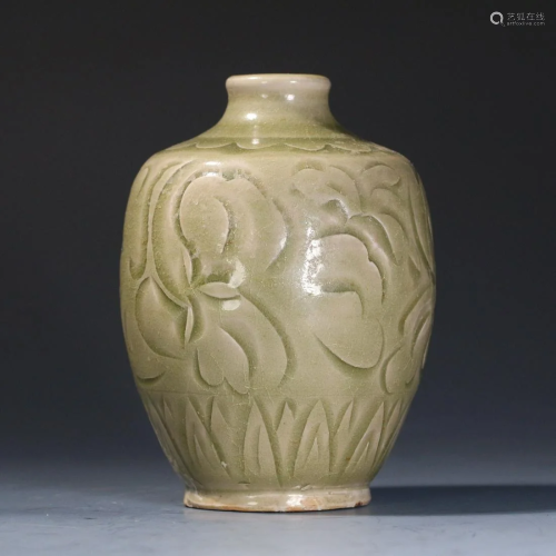 A CHINESE INCISED CELADON VASE