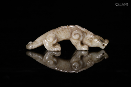 A CHINESE JADE CARVING OF MYTHICAL BEAST