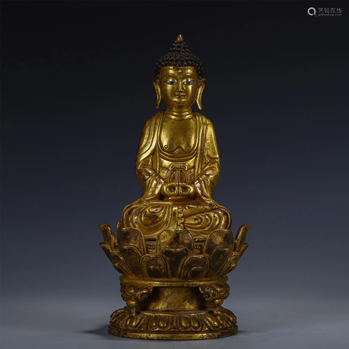 A CHINESE GILDING STATUETTE OF SAKYAMUNI