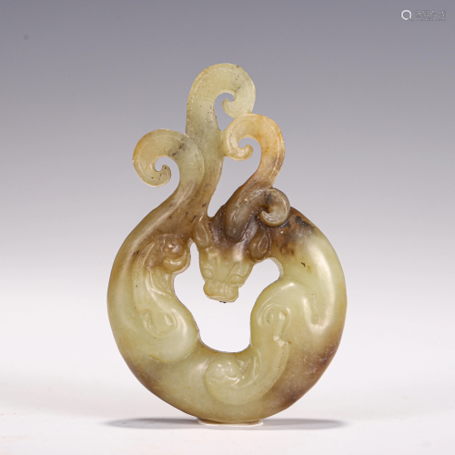 A CHINESE JADE CARVED DRAGON PENDANT