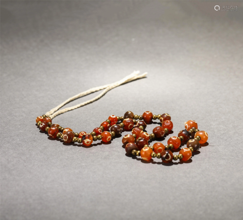 A STRING OF WESTERN ASIA BEADS