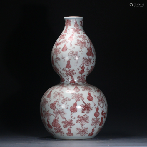 A CHINESE UNDERGLAZE RED PORCELAIN DOUBLE-GOURDS VASE
