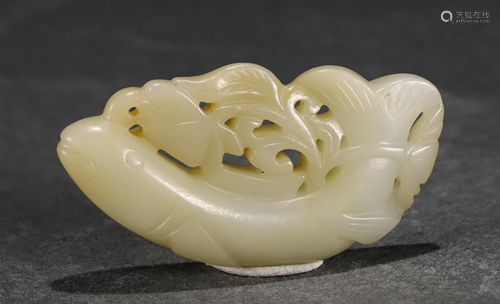 A CHINESE CARVED FISH SHAPED JADE BI