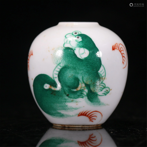 A CHINESE IRON-RED AND GREEN LIONS PORCELAIN JAR