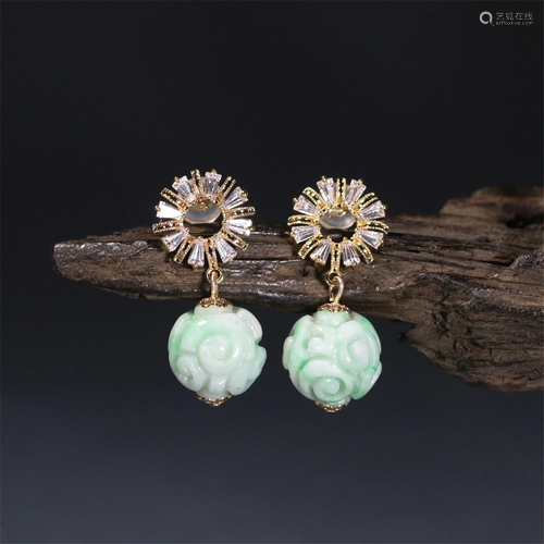 A PAIR OF CHINESE JADEITE EAR DROPS