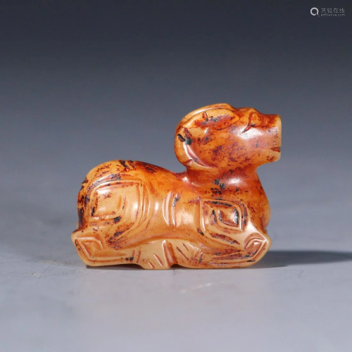 A CHINESE JADE CARVED DECORATION OF MYTHICAL BEAST