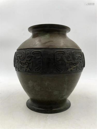A BRONZE ZUN VASE WITH INCISED BEAST PATTERNS
