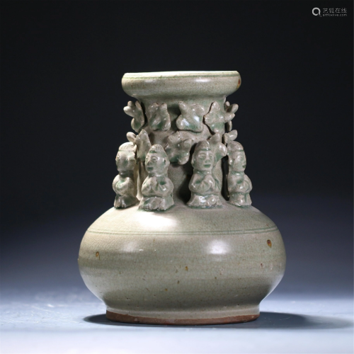 A CHINESES CELADON DECORATION WITH FIGURAL CARVI…