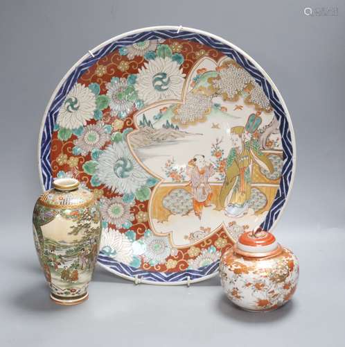 A Japanese Imari charger, a Kutani jar and cover and a Satsu...