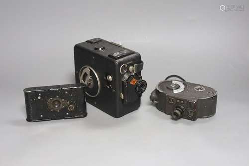 A Bell & Howell Filmo 8mm camera, an Agfa cine camera and an...