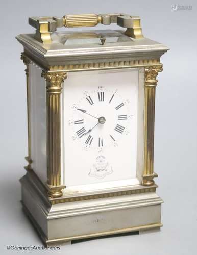 A silvered and gilt brass Corinthian pattern carriage clock,...