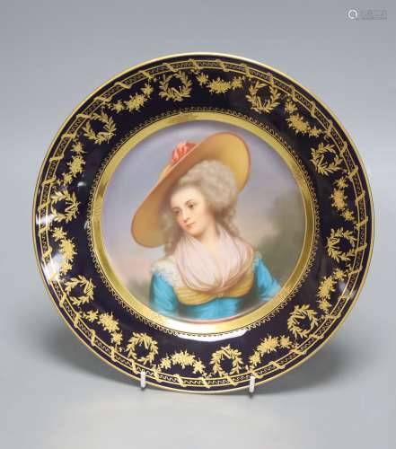 A Vienna style porcelain plate, c.1900, painted with a portr...
