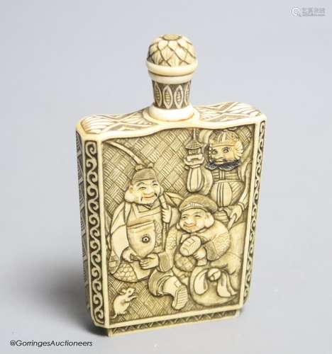 A Japanese carved ivory ‘Gods of Happiness’ snuff bottle, ea...