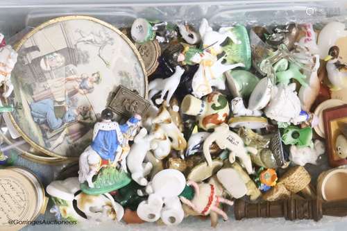 A collection of miniature ceramic and glass figures and anim...