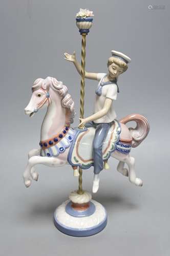 A Lladro figure, Boy on a Carousel Horse, height 39cmH 39cm