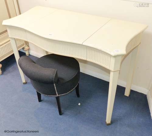 A cream and parcel gilt 'eclectic' dressing table by And So ...