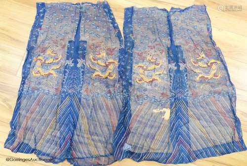 Two Chinese finely woven gauze panels with gold dragon embro...