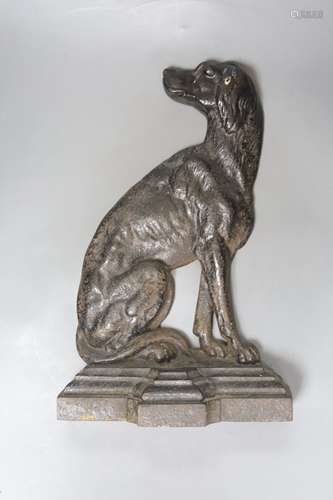 A Victorian Coalbrookdale style cast iron seated spaniel doo...