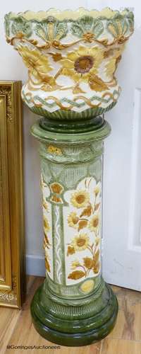 A Burmantofts faience jardiniere on pedestal, 105cm high