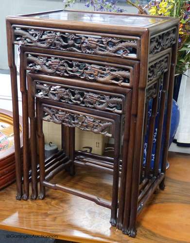 A Chinese nest of four hongmu tables, early 20th century, wi...