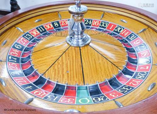 A large A.B.P. London casino roulette wheel, 78 cm diameter,...